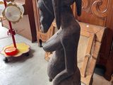 a statue of a woman holding a baby in her arms