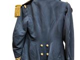 an image of a blue jacket with gold buttons on a hanger