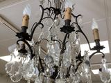 a chandelier hanging from the ceiling in a room