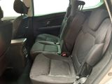 the back seats of a car with a seat belt in the back of it