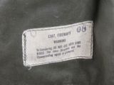 a label on the back of a jacket that says coat friends warning