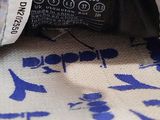 a picture of a close up of a bag with a label on it