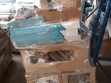 many boxes stacked on top of each other in a warehouse