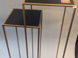 three tables that are sitting next to each other on a table