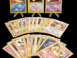 a lot of pokemon cards on a black background