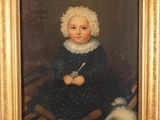 portrait of a child in a blue dress with a white bonnet and a white dog