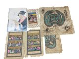 an image of a collection of old books with drawings on them