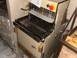 a machine that is sitting in the corner of a room