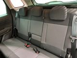 the back seats of a car with a seat belt in the back