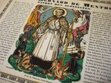 a picture of a book with a picture of a saint on it
