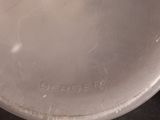 a close up of a metal pan on a table