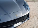 a black sports car parked on the side of the road