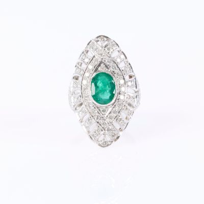 an emerald and diamond ring