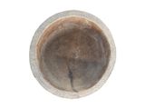 a brown bowl sitting on top of a white table