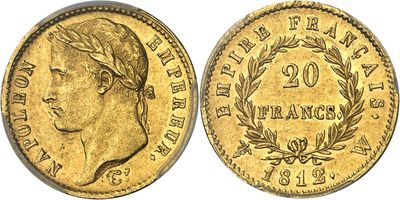 a gold coin with a woman ' s face and laurels on it