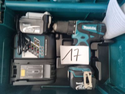 a green box with tools in it and a price tag on it
