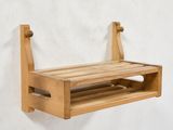 a wooden shelf with a wooden shelf attached to it