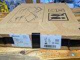 a box that is sitting on a wooden table
