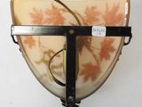 an image of a wall mounted lamp with a glass shade on it