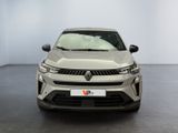 the front view of a silver car in a white room