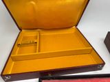 a box with a comb in it on a table