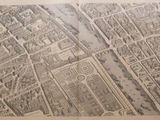 an old map of a city with a river running through it