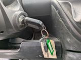 a key that is attached to the front of a car