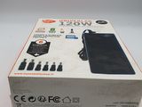 an open box of a cell phone sitting on top of a table