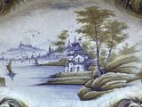 a plate with a picture of a castle on it