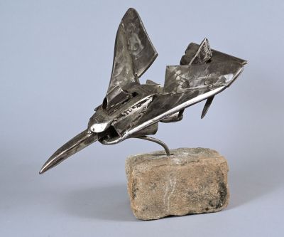 G. SALOMON (XXe siècle) Sculpture d'avion en métal