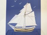 a picture of a picture of a sailboat in the water