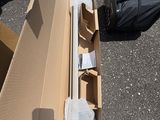 a cardboard box that is sitting on the ground