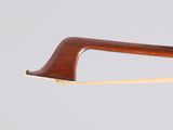 the back of a pair of glasses with a wooden frame