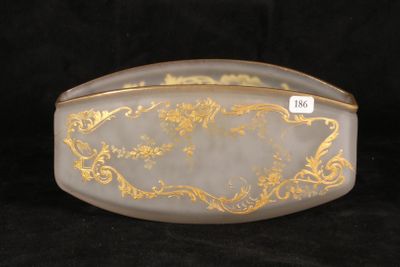 an image of a gold and white glass box