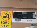 a cardboard box with a sticker on it that says loud heavy
