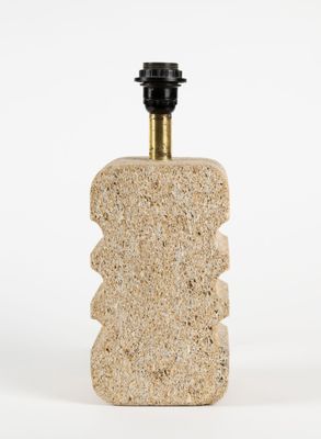 an image of a stone bottle with a cork stopper on it