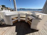 an image of a kitchen on a boat with a view of the water