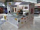 a display case in the middle of a shopping mall