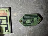 a picture of a close up of a green label on a machine