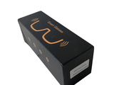a black box that has a gold logo on it