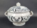 an image of a tureeny dish with a lid