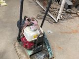 a small machine that is sitting on a pallet