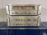 a silver stereo system sitting on top of a blue table