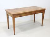 an old wooden table with two drawers and a drawer underneath it