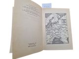 an open book with a drawing of a map on it