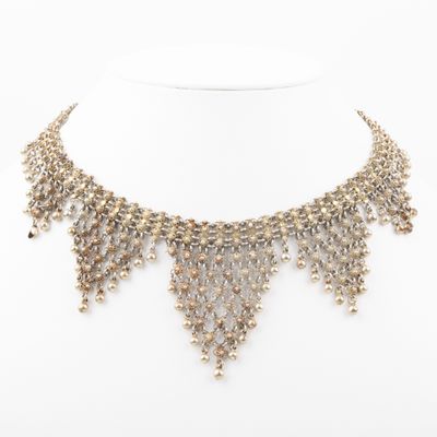 a close up of a necklace on a mannequin mannequin mannequin mannequin mannequin mannequin mannequin mannequin