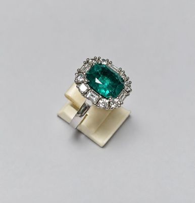 an emerald and diamond ring