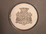 a picture of a plate with a coat of arms on it