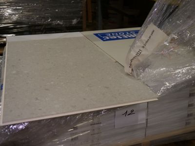 a stack of boxes that are sitting on top of a pallet