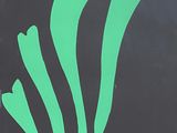a black sign with a green flower on it